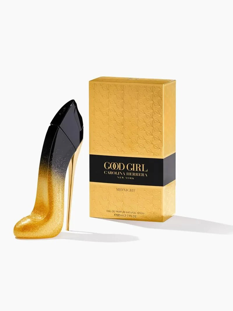 Perfume bottle and packaging of 'good girl' by carolina herrera on a white background