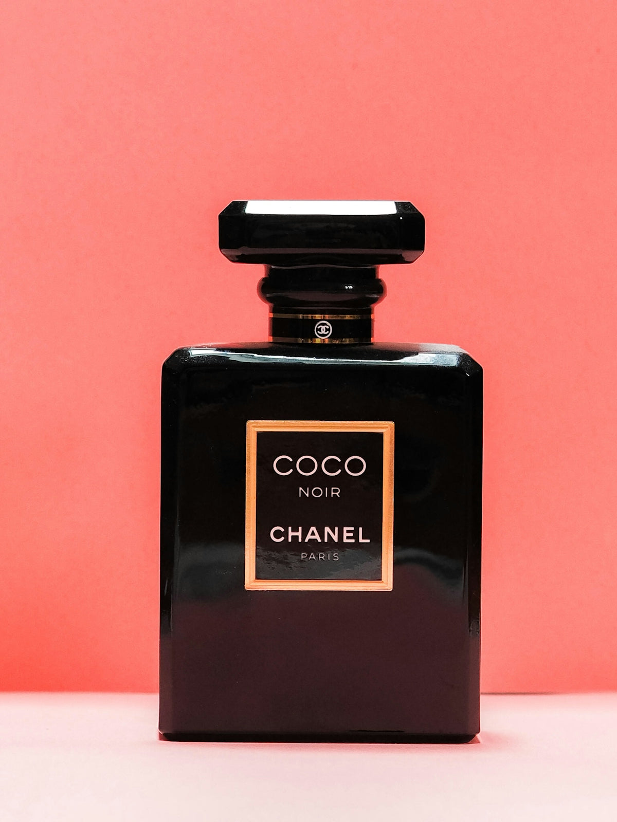 Black and gold perfume bottle