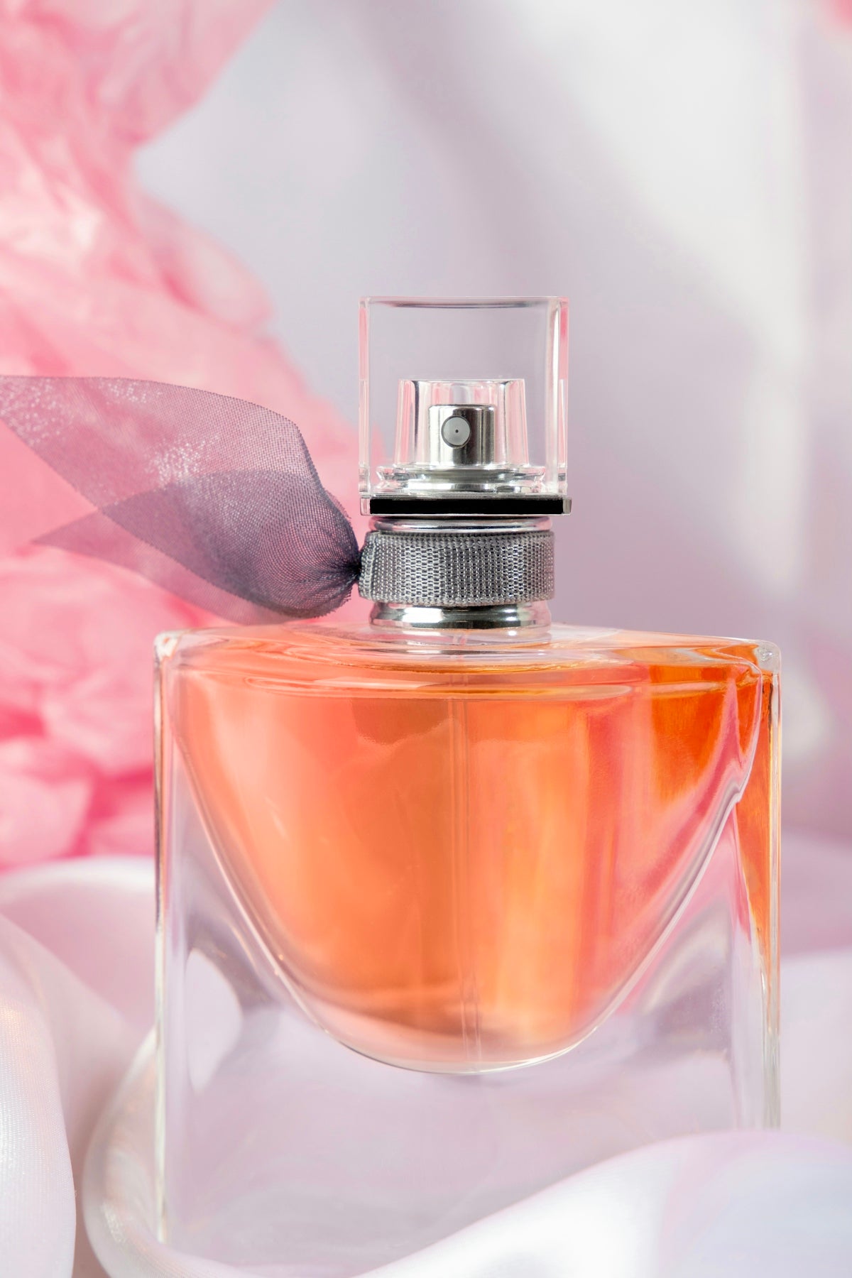 Pink and silver perfume bottle