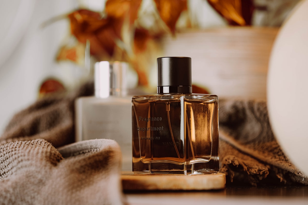 A bottle of perfume sitting on top of a table